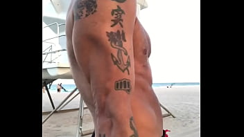 Muscle man in the beach
